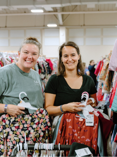 Two Moms Shopping the clothes at the JBF Harrington sale