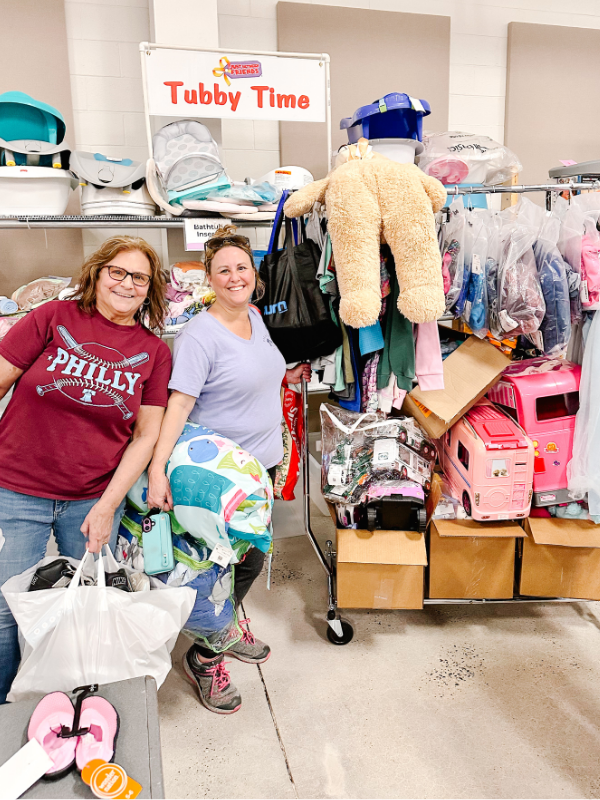 Mom dropping off items at the Harrington Children's consignment sale