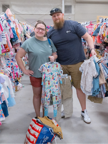 om and Dad shopping the clothes at the JBF Harrington Sale
