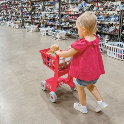Child shopping near shoes