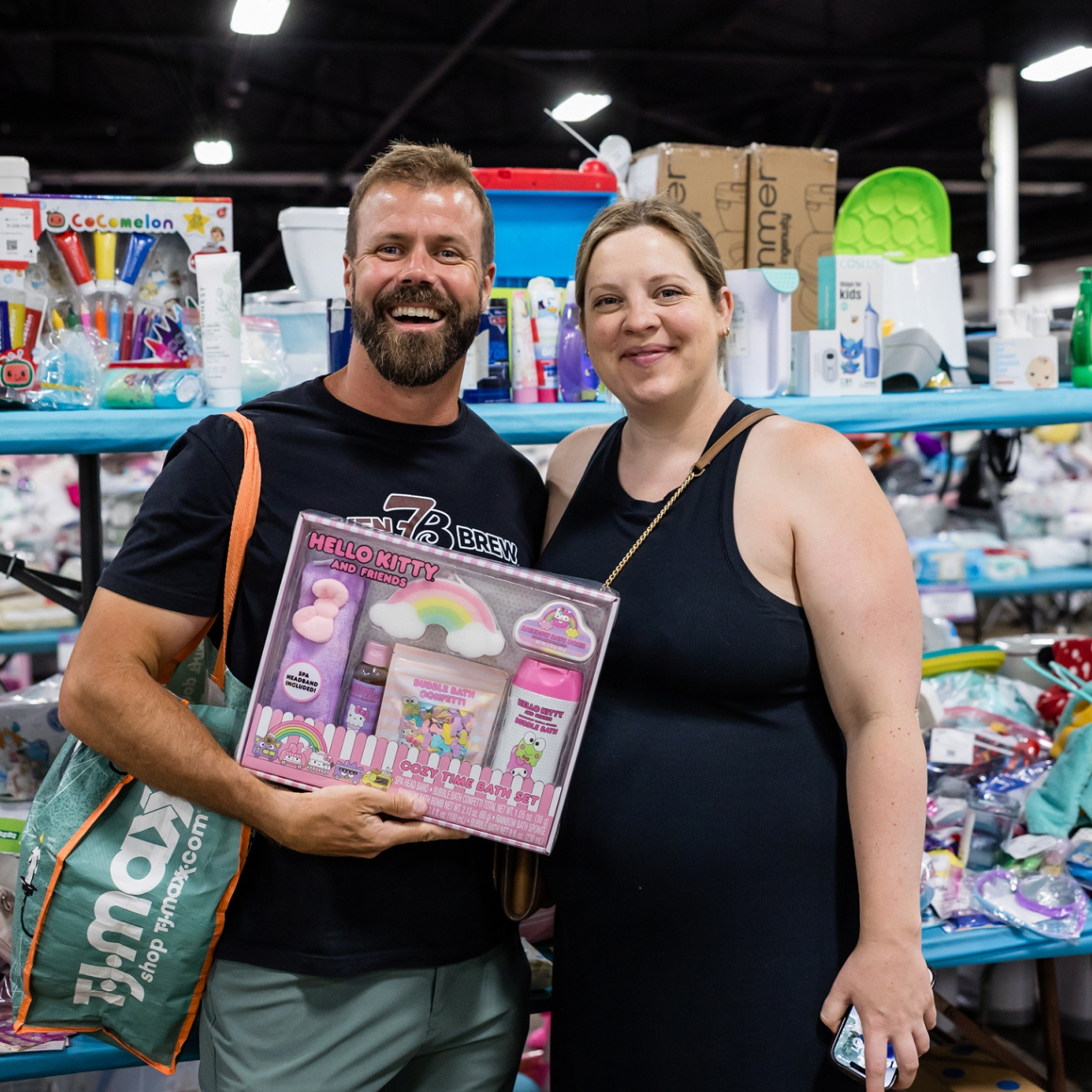 smiling man and woman shopping