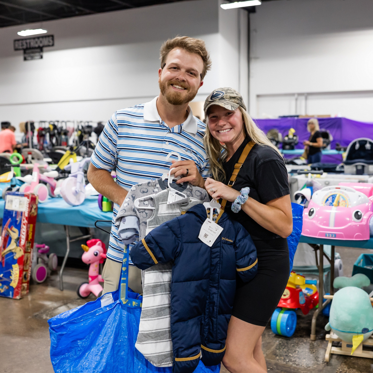 smiling man and woman shopping